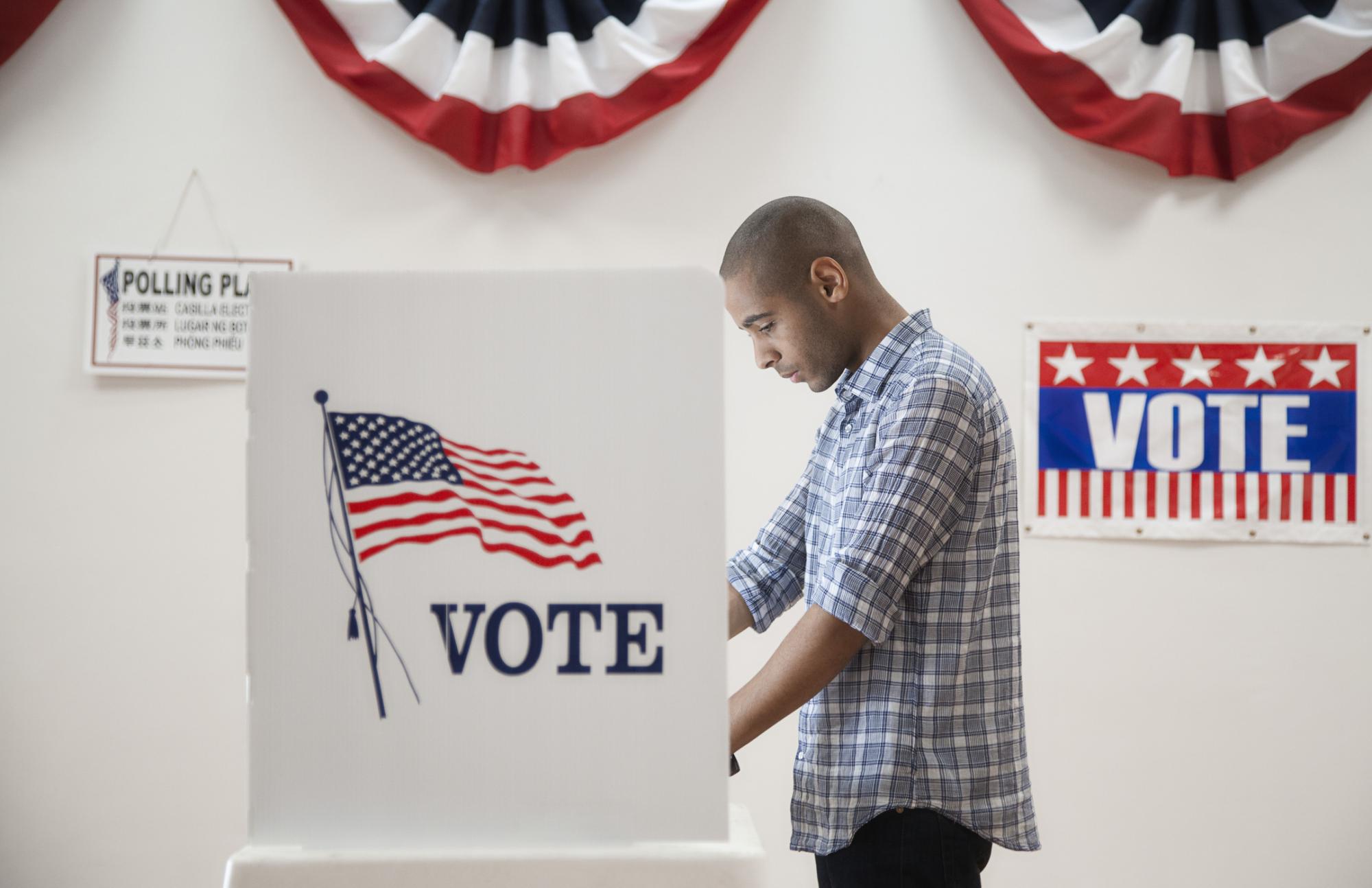 Man at a Voting Booth