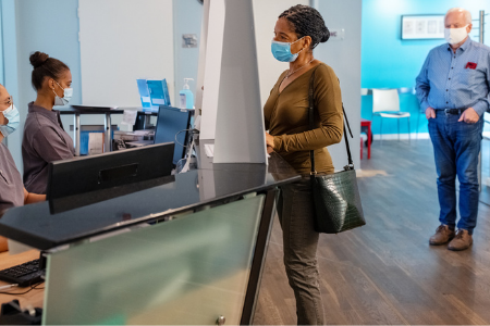 patients at reception desk