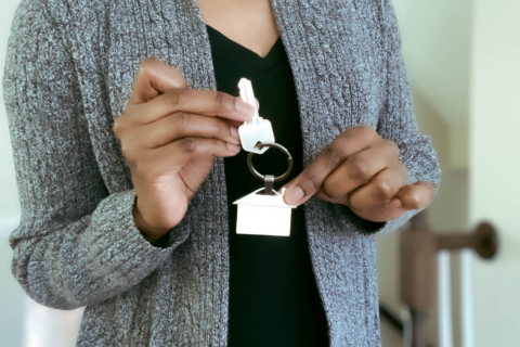 woman holding keys