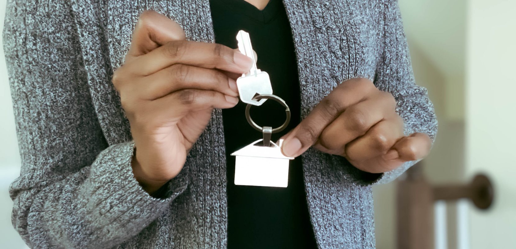 woman holding keys